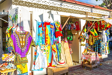 Traditional colourful clothing on Melville Street in St. George's, Grenada, Windward Islands, West Indies, Caribbean, Central America