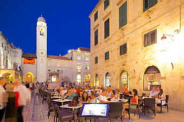 Clock tower and restaurants at dusk, Stradun, UNESCO World Heritage Site, Dubrovnik, Dalmatian Coast, Dalmatia, Croatia, Europe 