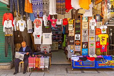 Colourful clothes, Souk Khan al-Zeit Street in Old City, Old City, UNESCO World Heritage Site, Jerusalem, Israel, Middle East