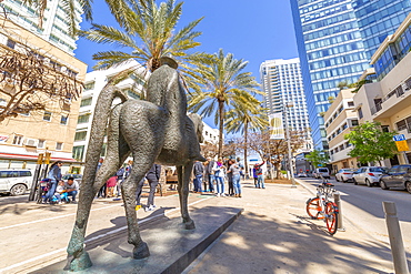 View of statue, palm trees and walkway on Rothschild Boulevard, Tel Aviv, Israel, Middle East