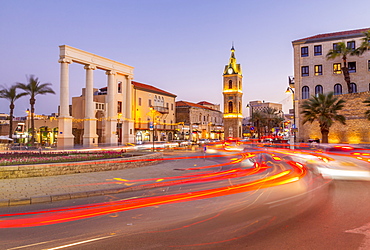 View of The Clock Tower and trail lights at dusk, Jaffa Old Town, Tel Aviv, Israel, Middle East