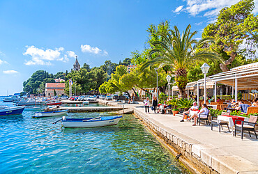 View of boats and old town restaurants in Cavtat on the Adriatic Sea, Cavtat, Dubrovnik Riviera, Croatia, Europe