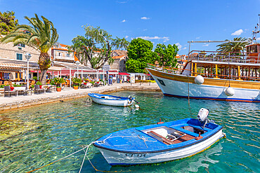 View of harbourside restaurants in Cavtat on the Adriatic Sea, Cavtat, Dubrovnik Riviera, Croatia, Europe