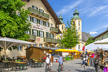 View of Church (Barocke Pfarrkirche) and market in St. Johann, Austrian Alps, Tyrol, Austria, Europe