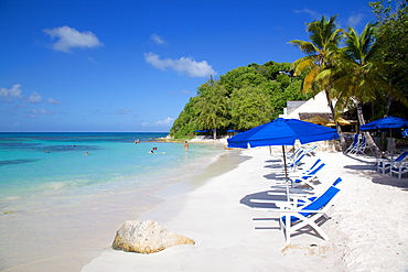 Beach and sunshades, Long Bay, Antigua, Leeward Islands, West Indies, Caribbean, Central America