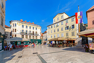 View of bars and cafes in People's Square (Pjaca), Split, Dalmatian Coast, Croatia, Europe