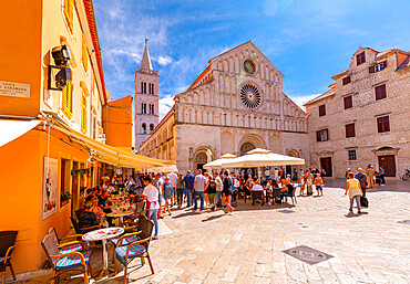 View of busy restaurant and Cathedral of St. Anastasia, Zadar, Zadar county, Dalmatia region, Croatia, Europe