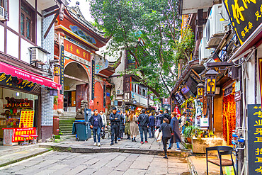 Busy shopping street in Ciqikou Old Town, Shapingba, Chongqing, China, Asia