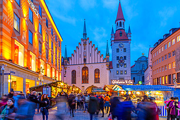 View of Old Town Hall and bustling Christmas Market in Marienplatz at dusk, Munich, Bavaria, Germany, Europe