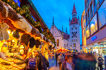 View of Old Town Hall and bustling Christmas Market in Marienplatz at dusk, Munich, Bavaria, Germany, Europe