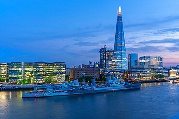 View of the Shard, HMS Belfast and River Thames from Cheval Three Quays at dusk, London, England, United Kingdom, Europe