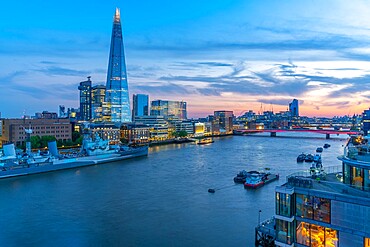 View of The Shard, HMS Belfast and River Thames from Cheval Three Quays at dusk, London, England, United Kingdom, Europe