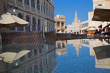 The restored Souq Waqif and spiral Mosque of the Kassem Darwish Fakhroo Islamic Centre, Qatar, Middle East