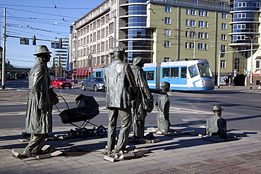 Memorial statues and tram, Old Town, Wroclaw, Silesia, Poland, Europe