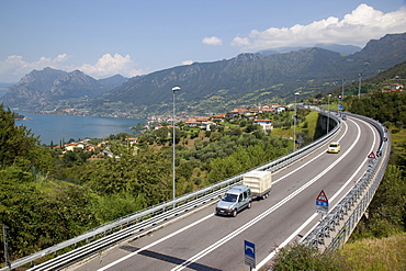 Lake and the S10 road, Lake Iseo, Lombardy, Italian Lakes, Italy, Europe