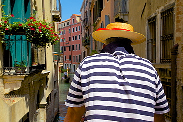 Canal and gondolier, Venice, Veneto, Italy, Europe