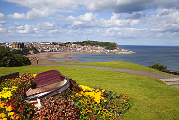 Rowing boat and flower display at South Cliff Gardens, Scarborough, North Yorkshire, Yorkshire, England, United Kingdom, Europe