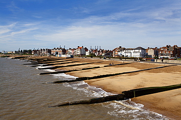 Felixstowe Beach from the pier with Container Port cranes in the distance, Felixstowe, Suffolk, England, United Kingdom, Europe 