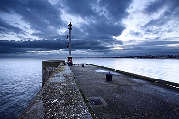 Sea wall and Harbour Light at Bridlington, East Riding of Yorkshire, England, United Kingdom, Europe