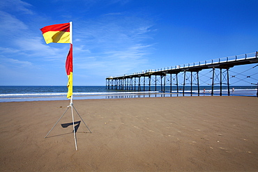 Safe Bathing flag on the beach at Saltburn by the Sea, Redcar and Cleveland, North Yorkshire, Yorkshire, England, United Kingdom, Europe 