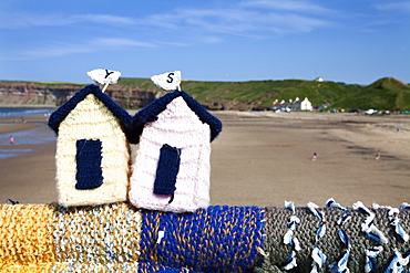 Saltburn Yarn Stormers Knitted Beach Huts on the Pier at Saltburn by the Sea, Redcar and Cleveland, North Yorkshire, Yorkshire, England, United Kingdom, Europe