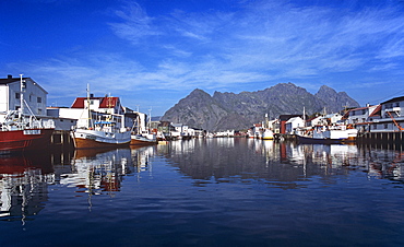 Calm water in the harbour at Henningsvaer in the Lofoten Islands, Norway, Scandinavia, Europe