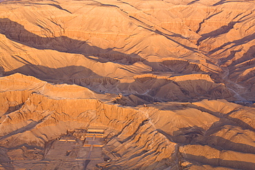 Aerial view from hot air balloon of Hatshepsut's Mortuary Temple at Deir el-Bahri, and the Valley of the Kings at sunrise, Thebes, UNESCO World Heritage Site, Egypt, North Africa, Africa