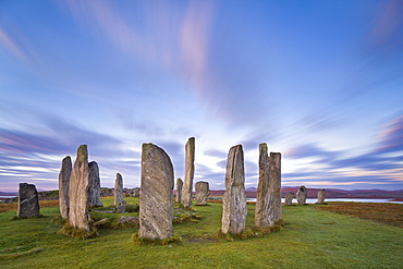 The Lewisian gneiss stone circle at Callanish on an early autumnal morning with clouds forming above, Isle of Lewis, Outer Hebrides, Scotland, United Kingdom, Europe