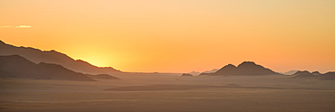 The sun goes down in the NamibRand Nature Reserve, Namib Desert, Namibia, Africa 