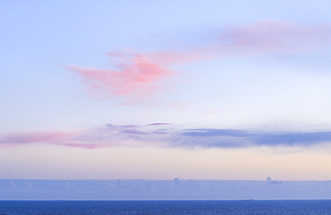 Pink clouds above the North Sea at sunrise, Flamborough Head, East Yorkshire, Yorkshire, England, United Kingdom, Europe