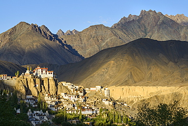 The town and monastery of Lamayuru, backed by mountains in the evening sun, Ladakh, Himalayas, India, Asia