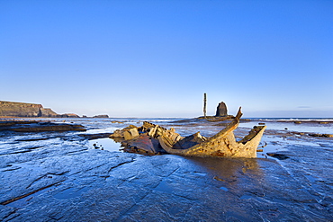 Admiral Von Tromp's wreck and Black Nab at low tide in Saltwick Bay, Yorkshire, England, United Kingdom, Europe