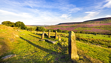 Standing stones on the North Yorkshire Moors with Arden Great Moor in the distance, Yorkshire, England, United Kingdom, Europe