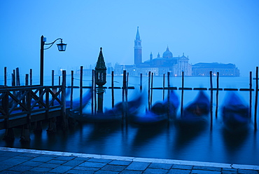 Gondolas on the waterfront of St. Mark's Basin at dawn, Venice, UNESCO World Heritage Site, Veneto Province, Italy, Europe