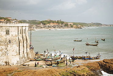 Fishermen preparing boats at Cape Coast Castle, Cape Coast, Ghana, Africa