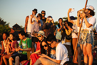 Tourists enjoying sunset at Tanah Lot Temple, Bali, Indonesia, Southeast Asia, Asia