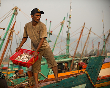 Dawn at Kampot Harbour as fishing boats return with night's catch, Kampot Province, Cambodia, Indochina, Southeast Asia, Asia 