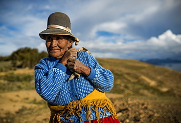 Portrait of local Bolivian woman, Isla del Sol, Lake Titicaca, Bolivia, South America