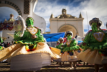 Dancers in traditional costume, Fiesta de la Virgen de la Candelaria, Copacabana, Lake Titicaca, Bolivia, South America