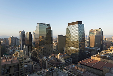 Aerial view of Central Santiago City at dawn from Apartment block rooftop, Calle Huerfanos, Santiago, Chile, South America