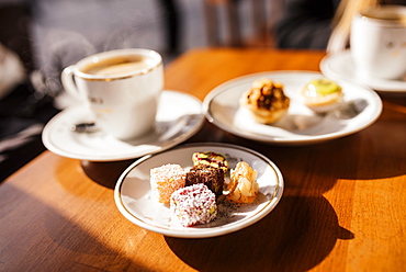 Turkish delights (Lokum) on plate and coffee, Cafe near Spice Bazaar, Istanbul, Turkey, Europe