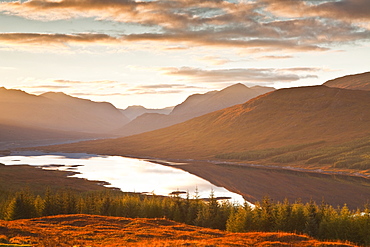 The setting sun over Loch Loyne in the Scottish Highlands, Scotland, United Kingdom, Europe