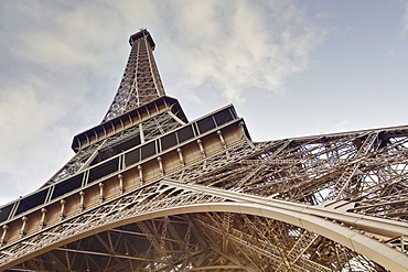 The Eiffel Tower towers overhead, Paris, France, Europe