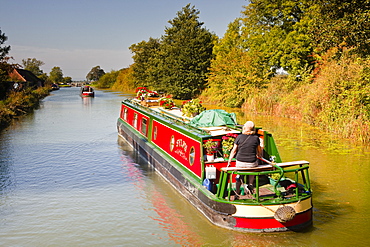 Canal boats idling their way down the Kennet and Avon Canal, Wiltshire, England, United Kingdom, Europe