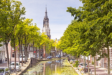 The historic centre of Delft, the Nieuwe Kerk church can be seen above the rooftops, Delft, The Netherlands, Europe