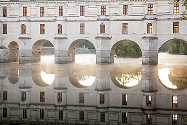 The chateau of Chenonceau, UNESCO World Heritage Site, reflecting in the River Cher at sunrise, Indre-et-Loire, Centre, France, Europe