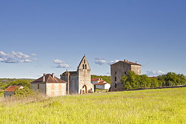 The church, reportedly owned by the Knights Templar, and old priory in Sainte Croix de Beaumont, Dordogne, France, Europe