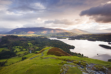 The rising sun lights up the fells of Skiddaw and Blencartha, Lake District National Park, Cumbria, England, United Kingdom, Europe 