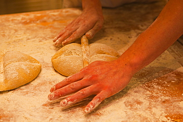 A baker prepares dough ready to be made into bread, Tours, Indre-et-Loire, France, Europe