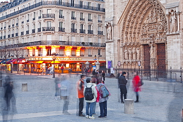 People gathered outside Notre Dame de Paris cathedral, Paris, France, Europe